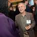 Bill Labedzki smiles as he chats with Sheyonna Watson during a cocktail hour during Dining for Dollars fundraiser for HARC at Zingerman's Roadhouse on Wednesday.  Melanie Maxwell I AnnArbor.com
